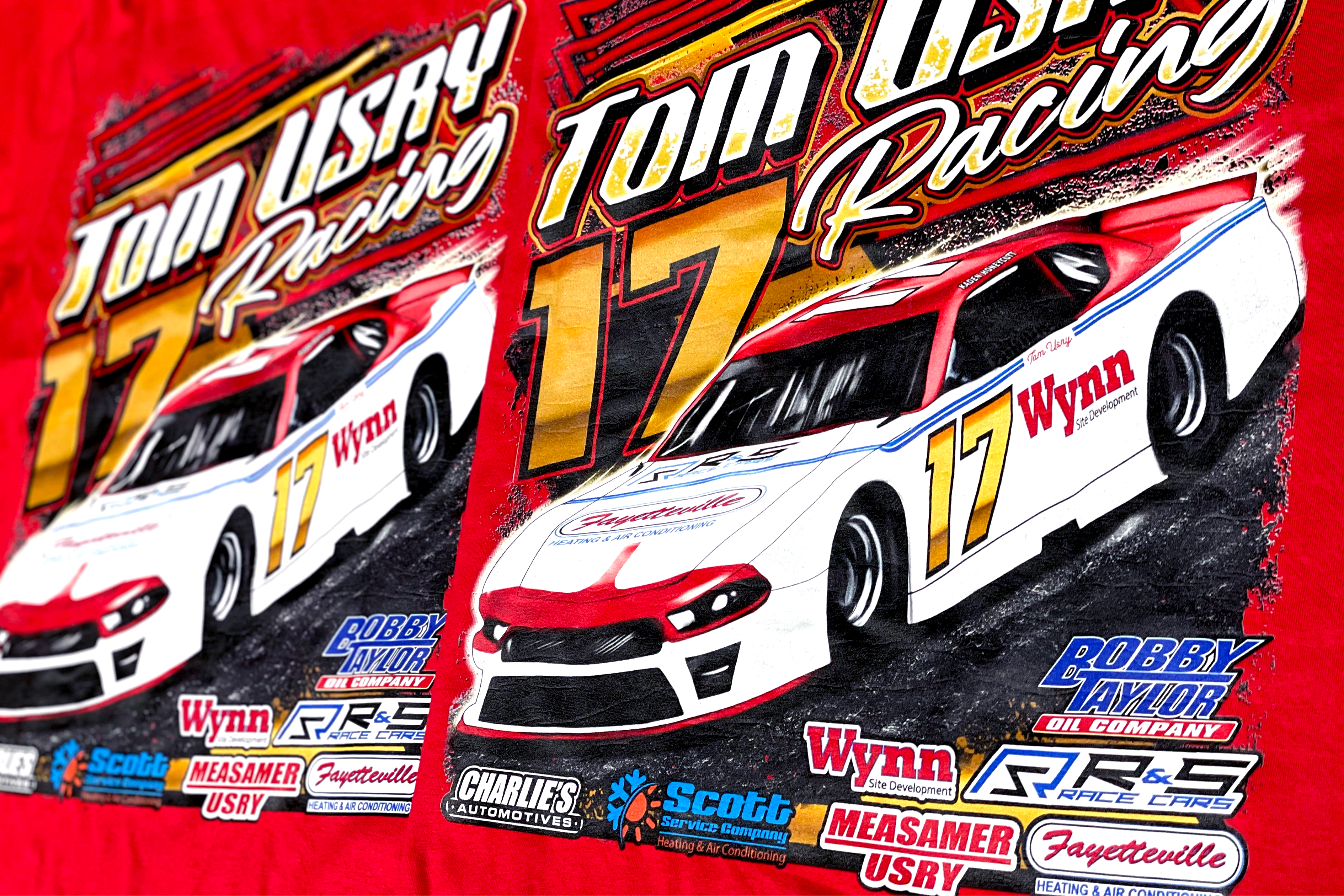 Red t-shirt with 'Tom USRY Racing' design featuring a race car and multiple sponsor logos.